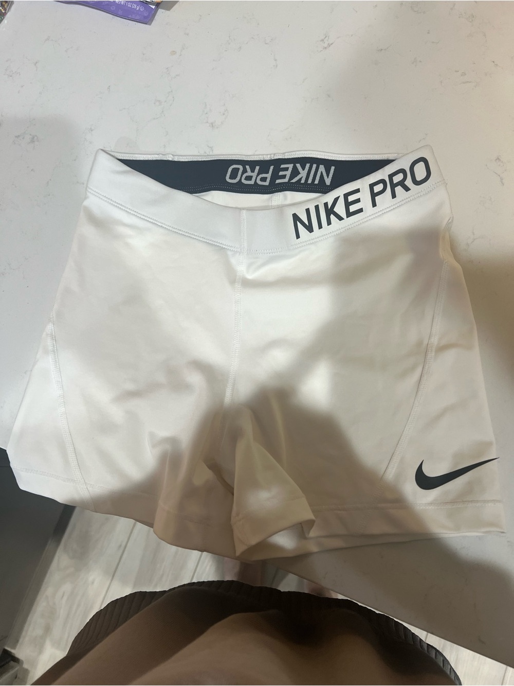 Nike Pro White Women's Athletic Shorts with Black Logo
